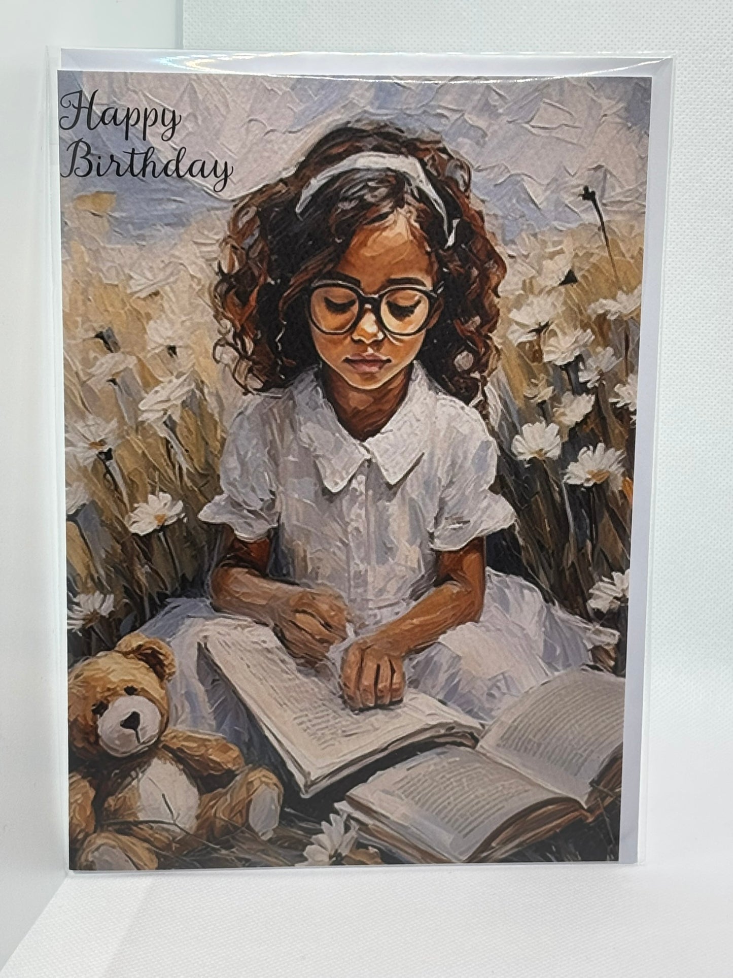 Young Girl Reading With Teddy
