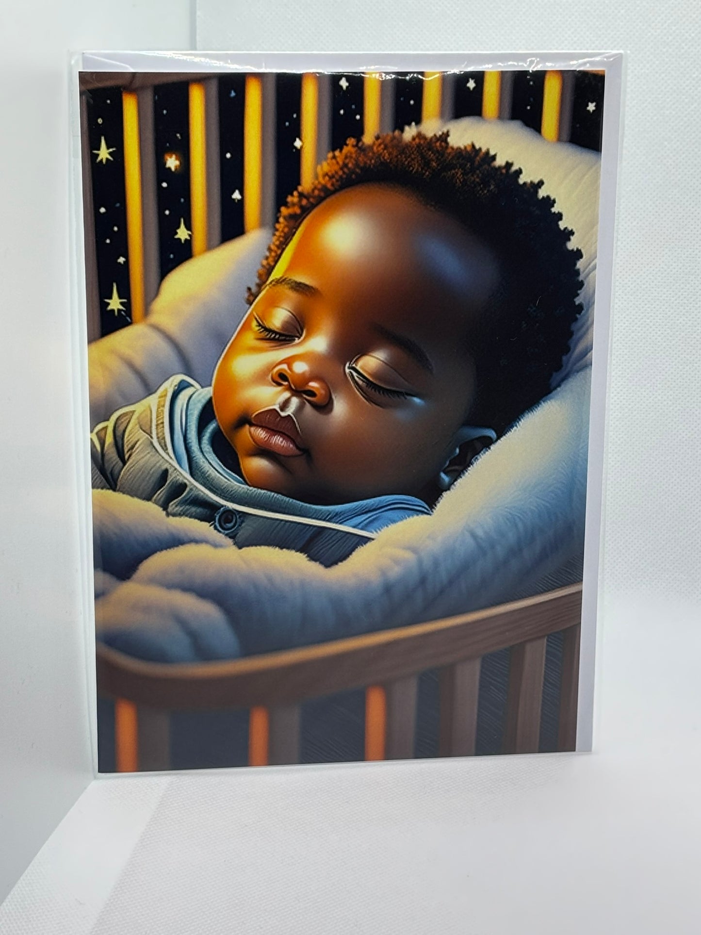 Small Baby Boy Asleep In A Cot